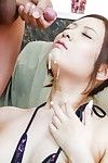 Petite Asian babe Yui Kasuga gets her slit stimulated by sex toys on couch