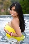 Chubby Asian gadget Kya Tropic is playing with hot boobs in the warm waves