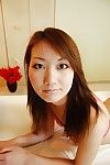 Playful asian teen Kazuha Kimura undressing and toying her hairy cunt