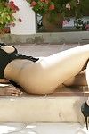 High heeled Jade Hsu shows off her sexy nude asian body in the backyard