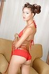 Frisky Asian babe Asiamax with funny ponytails strips red lingerie and stuffs toy in her box.