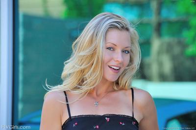 Blonde haired cute angel Lena Nicole takes off her costume and location naked outdoors