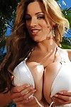 Massive titted Jordan Carver in bra, undersize firm shorts and heels attains soggy outdoors