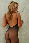 Blonde in fishnet loves to attain nasty and gently removing it at the same time as hot solo