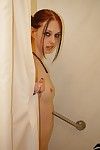 Cute naked redhead Liz Vicious is showing off her tits in the shower. She is lovely!