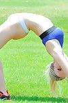Sporty blonde goes nude in public, posing and teasing with her forms