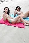 Busty babes in bikini Chanel and Missy posing together outdoor