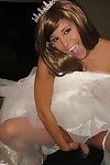 Melissa Midwest dressed in wedding dress shows and fingers her sexy hairless pussy