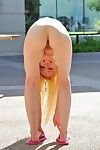 Flat chested blonde kitty Kennedy Kressler with smooth snatch strips naked outdoors