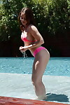 Leggy adolescent babe Kylie Quinn takes her clothes off off panties and bikini outdoors by pool