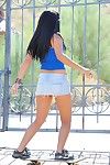 Corinne FTV takes off her short skirt and underwear outdoors to show her Chinese cage of love