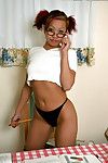 Nerdy Oriental adolescent Gia revealing compact love melons and muff in glasses and pigtails