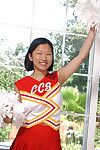 Korean young Maxine loosing giant common whoppers from cheerleader uniform