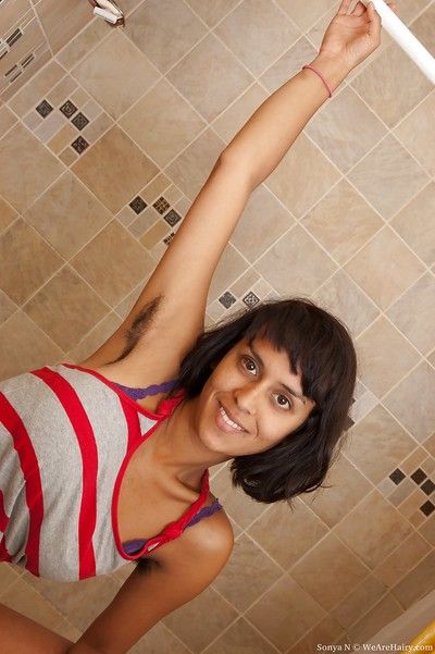 Smoking hot Indian babe with hairy armpits Sonya N stripping in the decontaminate